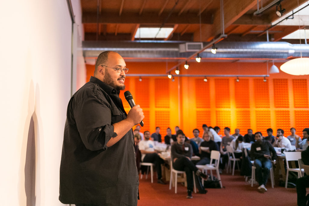 Michael Seibel, YC Alum & Managing Director and Group Partner of YC, speaking in front of a batch.